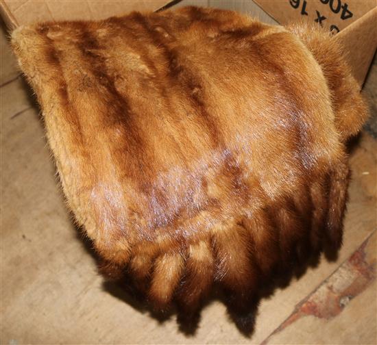 A Maison Sistovaris mink fur stole with pendant tails and a similar dark brown stole